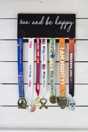 run and be happy medal holder