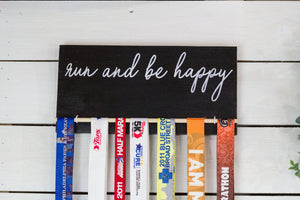 run and be happy medal holder