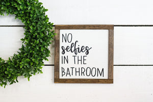 no selfies in the bathroom